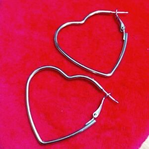 Silver plated, heart shaped earrings